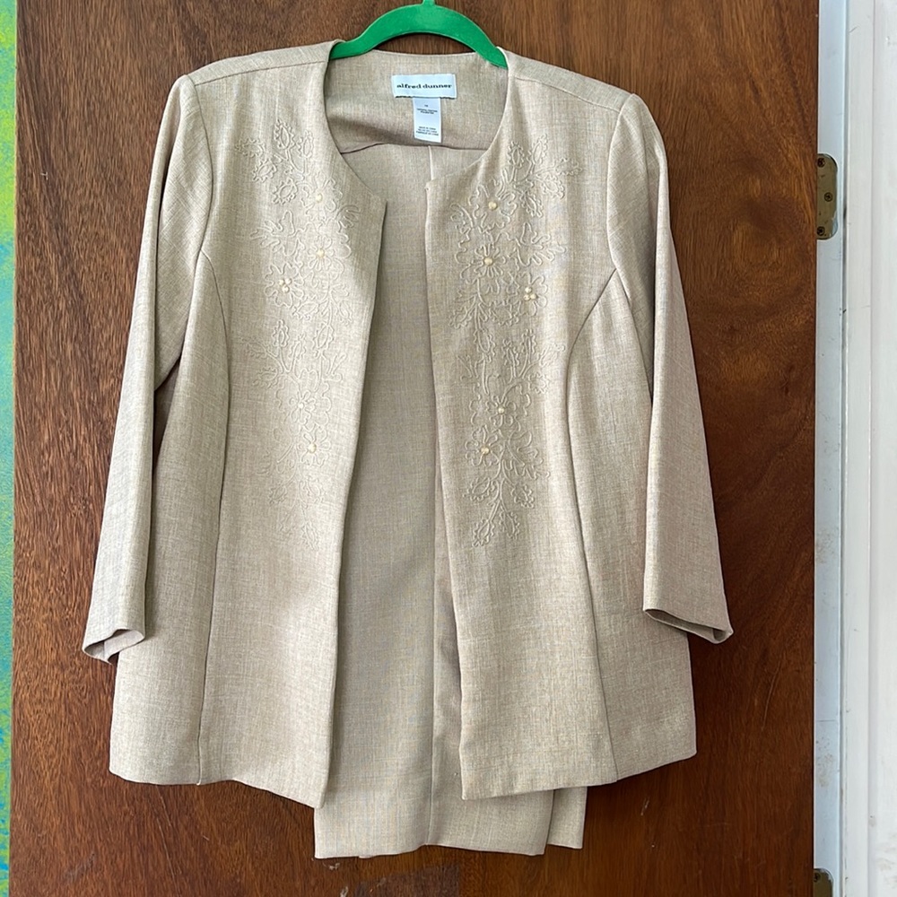 Tan colored suit, pants and jacket